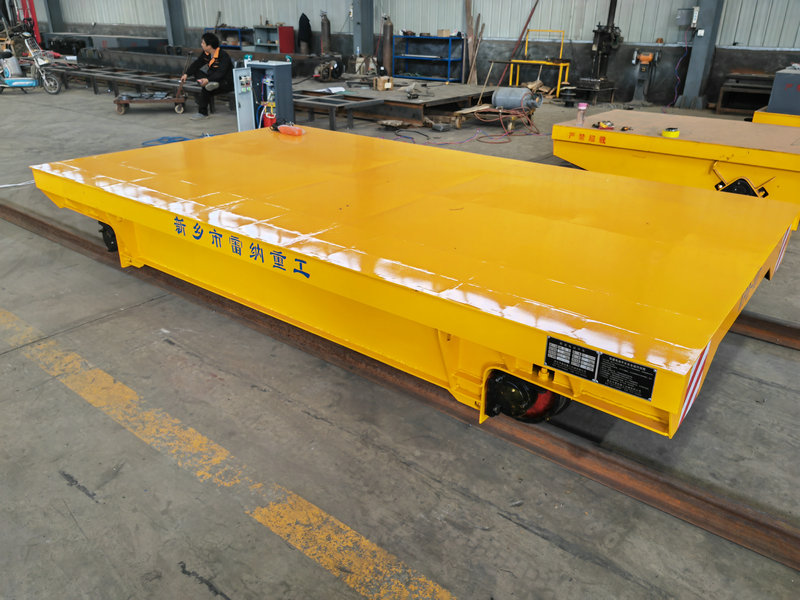 Solusi Transportasi Industri Low Voltage Rail Transfer Trolley
